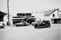 Building Port Orford Norms Market Movie Theater 4th of July c1950